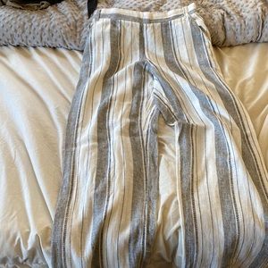 White and black stripped pants.